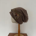 Slouchy Beanie with Decorative Buttons